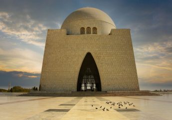 travel guide | destination | karachi | KHI | pakistan | Sunsets Warm Glow at the Mausoleum of MazareQuaid; Karachi; Pakistan-AdobeStock_772434422